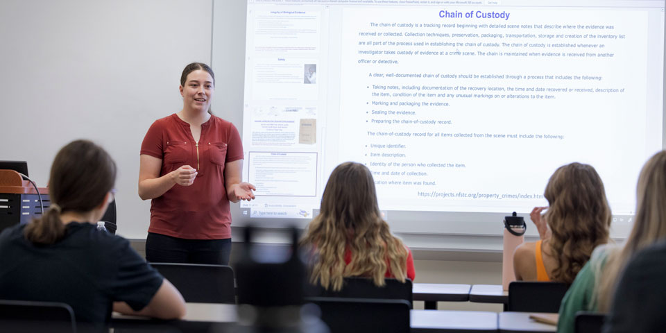 Brooke Buhr presenting to a forensic science class