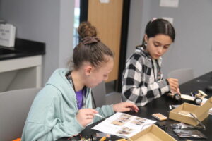 students following directions to build a remote car