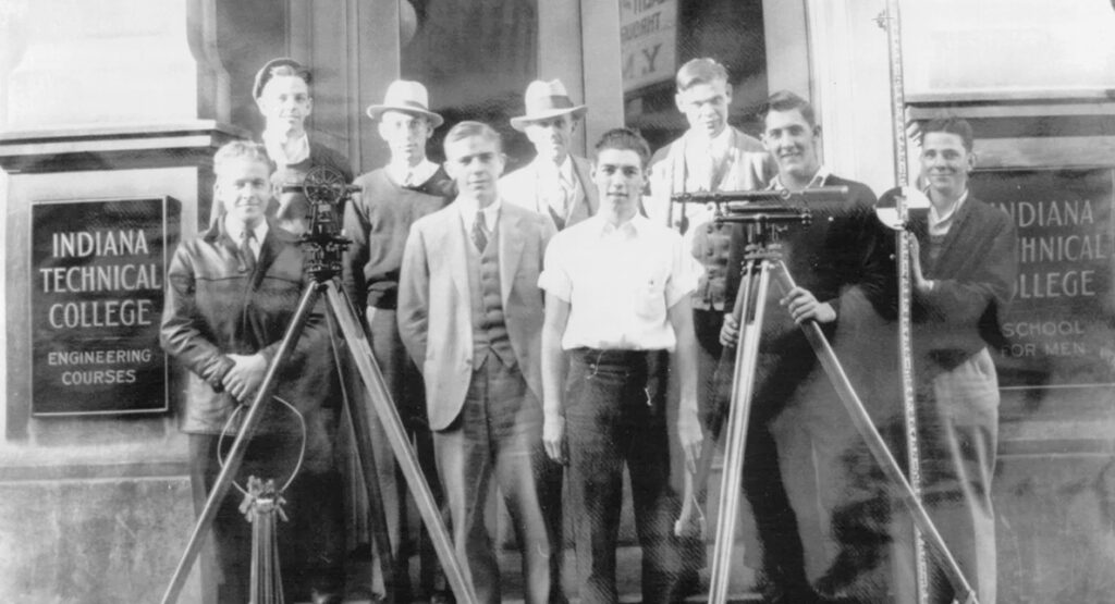 Indiana Tech students standing in front of the original location for Indiana Technical Institute